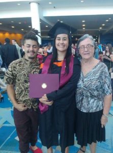 Graduation with brother and grandma